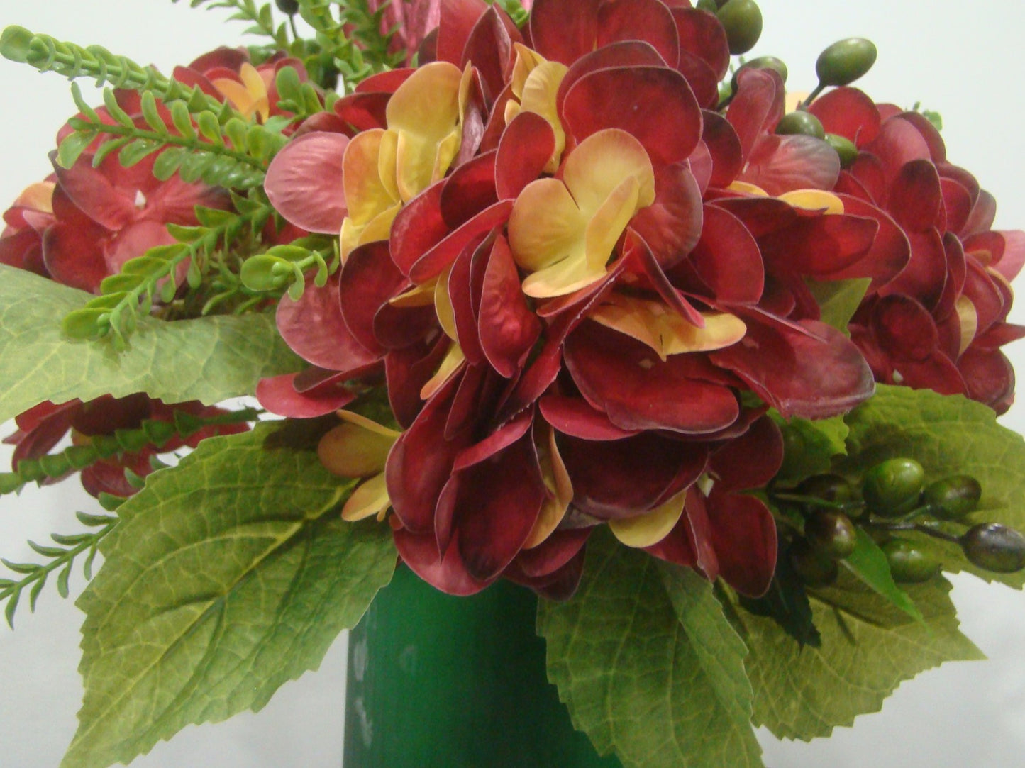 Real Touch Red Hydrangea With Okra Pods in Hunter Green Vase